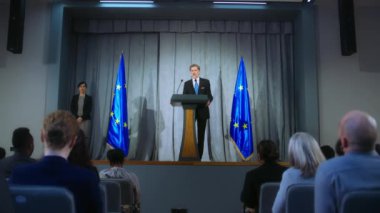 Kendine güvenen politikacı bir duyuru yapar, kampanya konuşması yapar, gazetecilere ve medyaya röportaj verir. Avrupa Birliği 'nin olgun temsilcisi basın toplantısında gösteri yapar. Seçim günü..