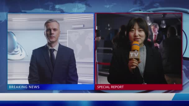Male Anchor News Studio Listens Live Report Asian Female Journalist — Vídeo de Stock