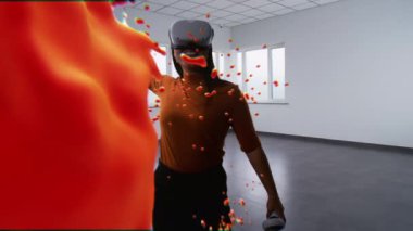 Sanal gerçeklikteki Asyalı genç kadın kablosuz kontrolörlerle resim yapıyor, soyut çevrimiçi sanat eserleri yaratmak için jestler yapıyor. Boya damlalarının holografik 3 boyutlu animasyonu. Gelişmiş gerçeklik teknolojisi.