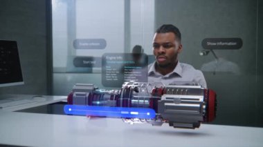 Afrikalı Amerikalı Mühendis Temiz Yeşil Enerji Motorunun 3 boyutlu holografik modelini geliştirmek için Artırılmış Gerçekliği Kullanıyor. Sanal Yazılım Kullanıcı Arayüzü 'nün Yapay Zeka tabanlı VFX Grafikleri.