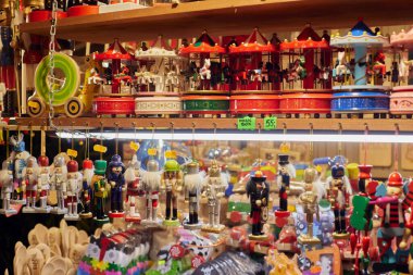 Various traditional polish wooden toys for kids on the Christmas market on the Rynek Glowny in Krakow.