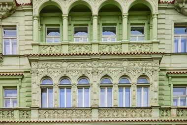 Green facade of czech architecture in Prague.