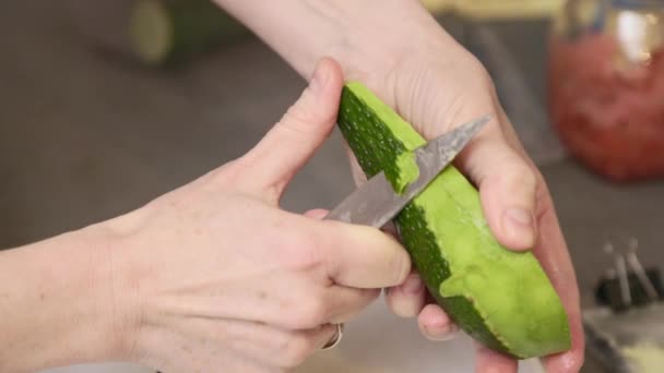 Woman Cleans Avocados Kitchen Vegan Breakfast Snack Video Slow Motion — Vídeo de stock