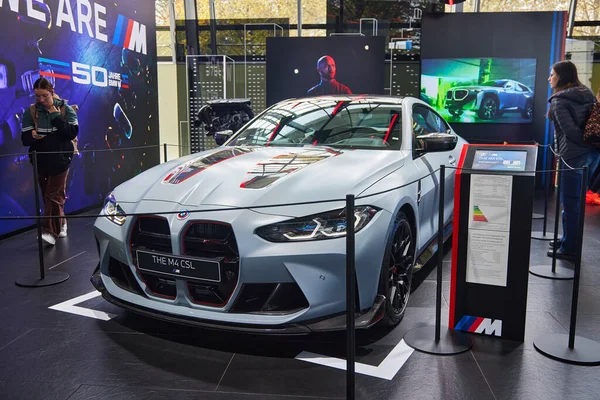 Munich, Germany - October 12th 2022 - The BMW Welt, grey BMW M4 CSL, headlights, hood and grill.
