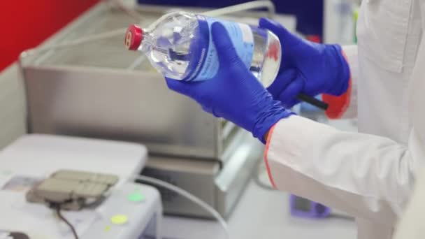Laboratory Assistant Writes Bottle Glycerol Researching — Wideo stockowe