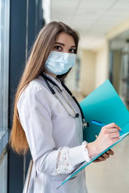 Professional nurse or doctor in blu