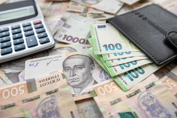 Exchange Concept Euro Bills Purse Calculator Lying Euro Banknotes Background — стоковое фото