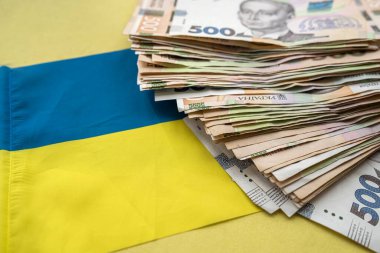 Ukraine national flag. Uah hrn gryvna hryvnia as business background,  financial concept