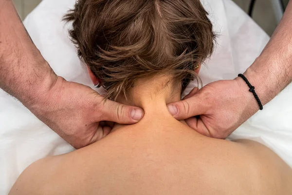 Close Physiotherapist Doing Neck Massage Young Female Client Medical Room – stockfoto