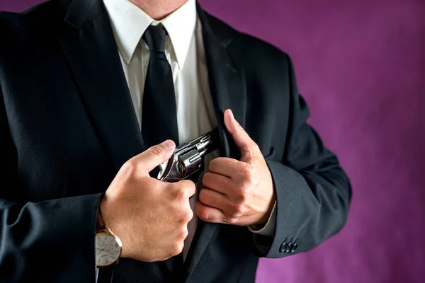 Cropped Length Portrait Man Suit Holding Gun Isolated Plain Background — Stock Photo, Image