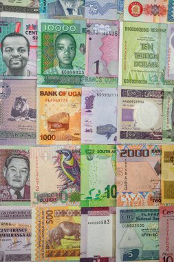 Background with folded banknotes for payment from Africa from top to bottom. Colorful. Trade. payment in African money
