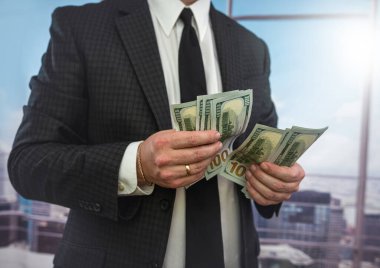 business man accounting stack of dollar money, finance or corruption concept