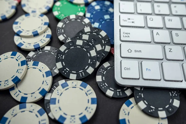 Computer Keyboard Laptop Poker Chips Placed Plain Background Isolated Gambling — Stock Photo, Image