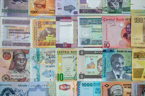 Close African Currency Various Colors Shapes Denominations Filled Entire Table — Fotografia de Stock