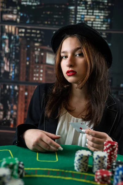 Attractive Girl Jacket Hat Holding Poker Cards Looking Camera Casino — Φωτογραφία Αρχείου