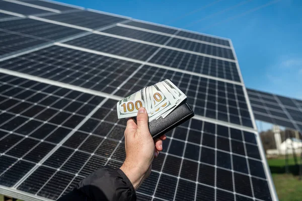 Female Hand Dollars Black Wallet Background Solar Panels Solar Energy — Foto de Stock