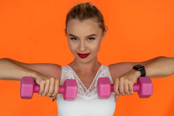 Beautiful Young Female Trainer Sports Top Holds Pink Dumbbells Her — Fotografia de Stock