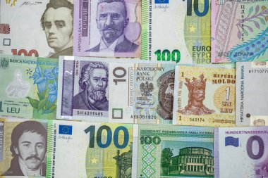 different european international money banknotes as background. business concept