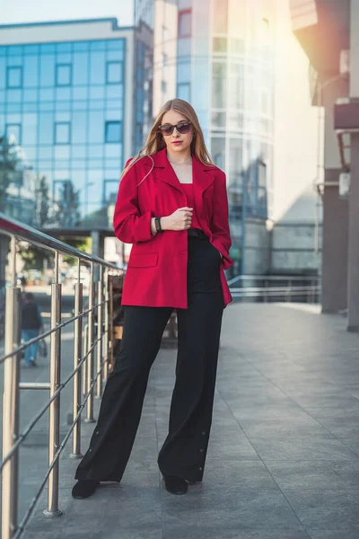 stock image Business woman portrait of a young urban professional businesswoman in a suit standing near an office building with her arms crossed. Confident successful multicultural woman. Portrait of a woman