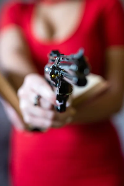 Slim Sexy Female Killer Bright Red Dress Holds Automatic Pistol — Stok fotoğraf