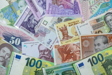 different european international money banknotes as background. business concept