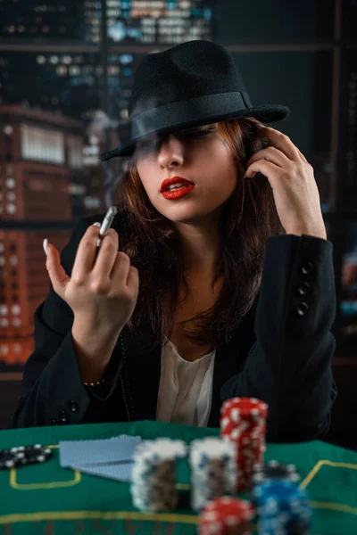Young Girl Stylishly Dressed Smokes Cigarette Blows Smoke Plays Cards — Stock fotografie
