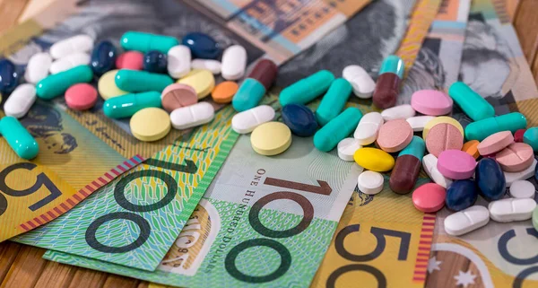 stock image Australian dollars money AUD with different pills, medicine concept, pharmacy