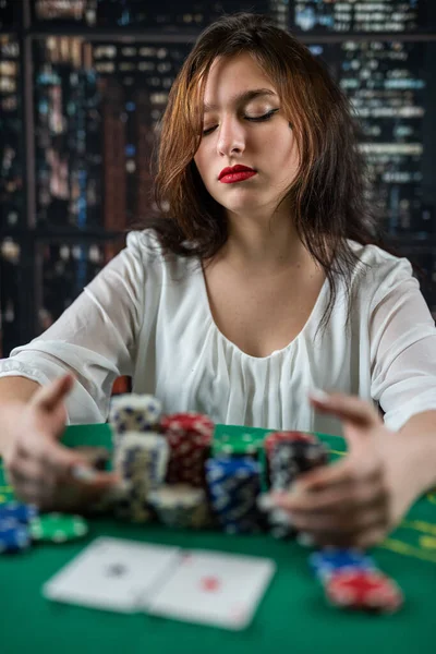 Young Woman Sitting Table Playing Poker Holding Chips Smiling Happy — Stockfoto