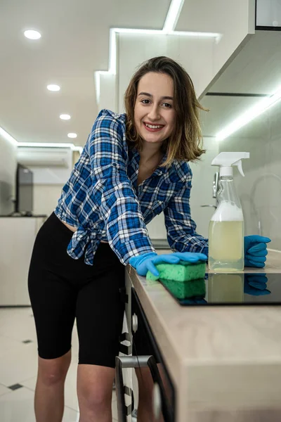 Young Woman Rubber Gloves Holds Rag Surface Cleaner Kitchen Cleans — стоковое фото