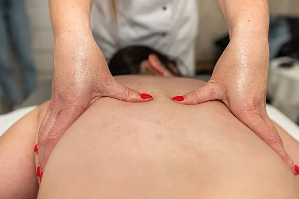 Woman Masseur Doing Massage Back Her Female Client Lying Face — Stock Photo, Image