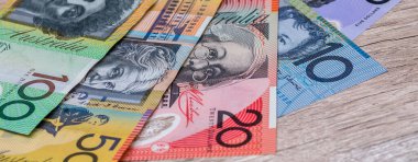 Australian Bank, arka plan için Avustralya doları (AUD) kaydediyor. Para ve tasarruf kavramı