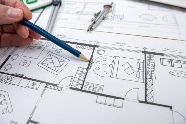 The architect-designer chooses and selects the color in the drawing of the design. Design studio concept