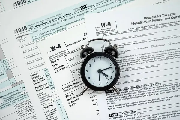 blank tax form 1040 w4 w9 on office desk, deadline. Taxation concept