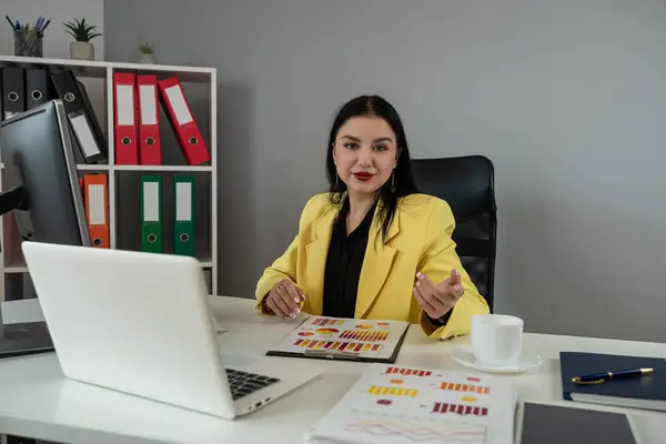 Business woman doing math finance or tax, annual report with financial documents and laptop at office. Accounting  statistics concept