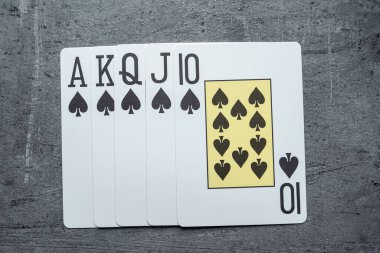 10 J Q K A Royal Floş maça. Kumar konsepti