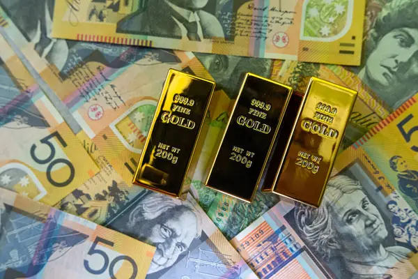 stock image rich saving investment concept with gold bars and aud australian dollar. Money from Australia