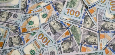 Amerikan parası arka plan olarak farklı dolar kağıt banknotları. Finansal iş veya tasarruf kavramı