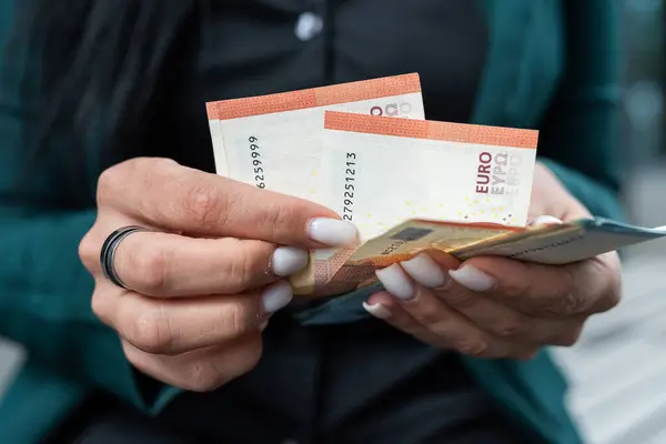 stock image Woman holding 10 20 euro money bills. Concept of finance or saving payment 