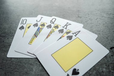 Poker oyununda Royal Royal floş, 10 J Q K A ile kağıt oynuyor. Kumar konsepti