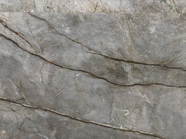 Doku ya da arka plan olarak İtalyan gri mermeri. Seramik duvar kiremitleri, doğal granit
