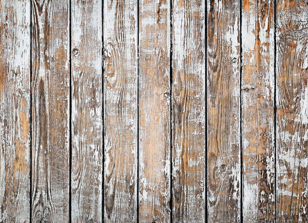 Vintage, rustic background. Texture of old wooden boards with peeling white paint.