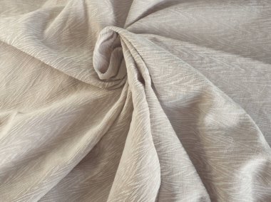 Bej doğal keten kumaş. Dokuma arkaplanı. Dikiş, moda ve kumaş için bej kumaş. Keten tekstil yüzeyi. Yumuşak dokuma yapısı. Doğal tekstil. Eko materyali. Bej estetik.