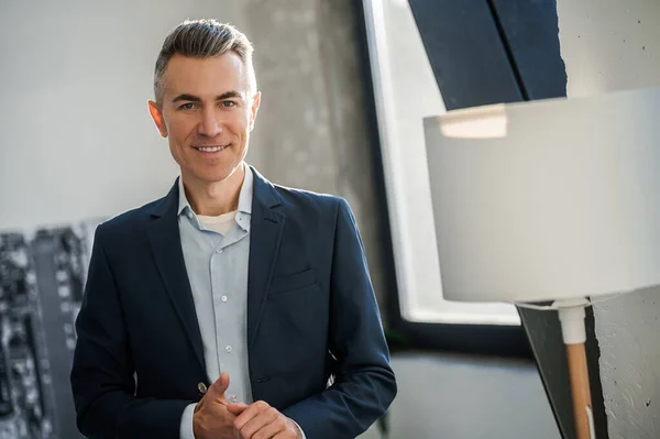 stock image Business person. Good-looking elegant man in a suit in the office