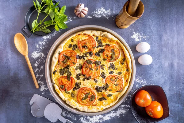 stock image Delicious margherita pizza with basil, garlic, tomatoes, eggs. On black background. Copy space.