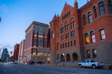 Dallas, Texas, 23 01 25, sunset view of the entrance of the Old Red Museum of Dallas County History & Culture next to the First Ferry and Bridge with no people on the street