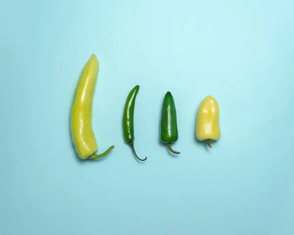 different color chili peppers size and thickness, male penis representation, erection concept, safe sex concept, male sexual health concept, no people