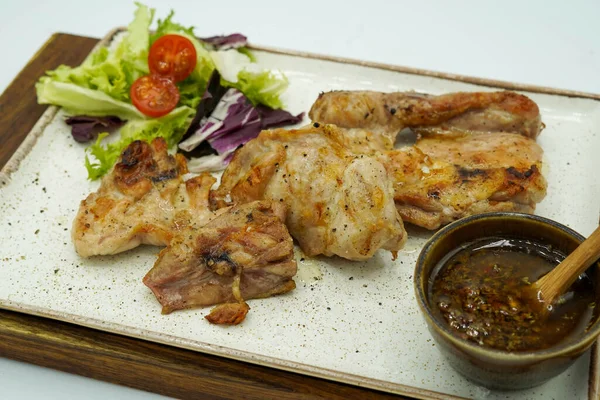 Grilled farm chicken in Mediterranean restaurant