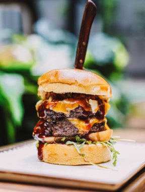 Tremendous double burger with extra cheddar cheese