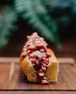Premium beef tartare inside a muffin bread