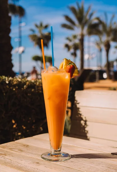 A Tequila Sunrise is a colorful and fruity cocktail that is typically made with tequila, orange juice, and grenadine syrup.
